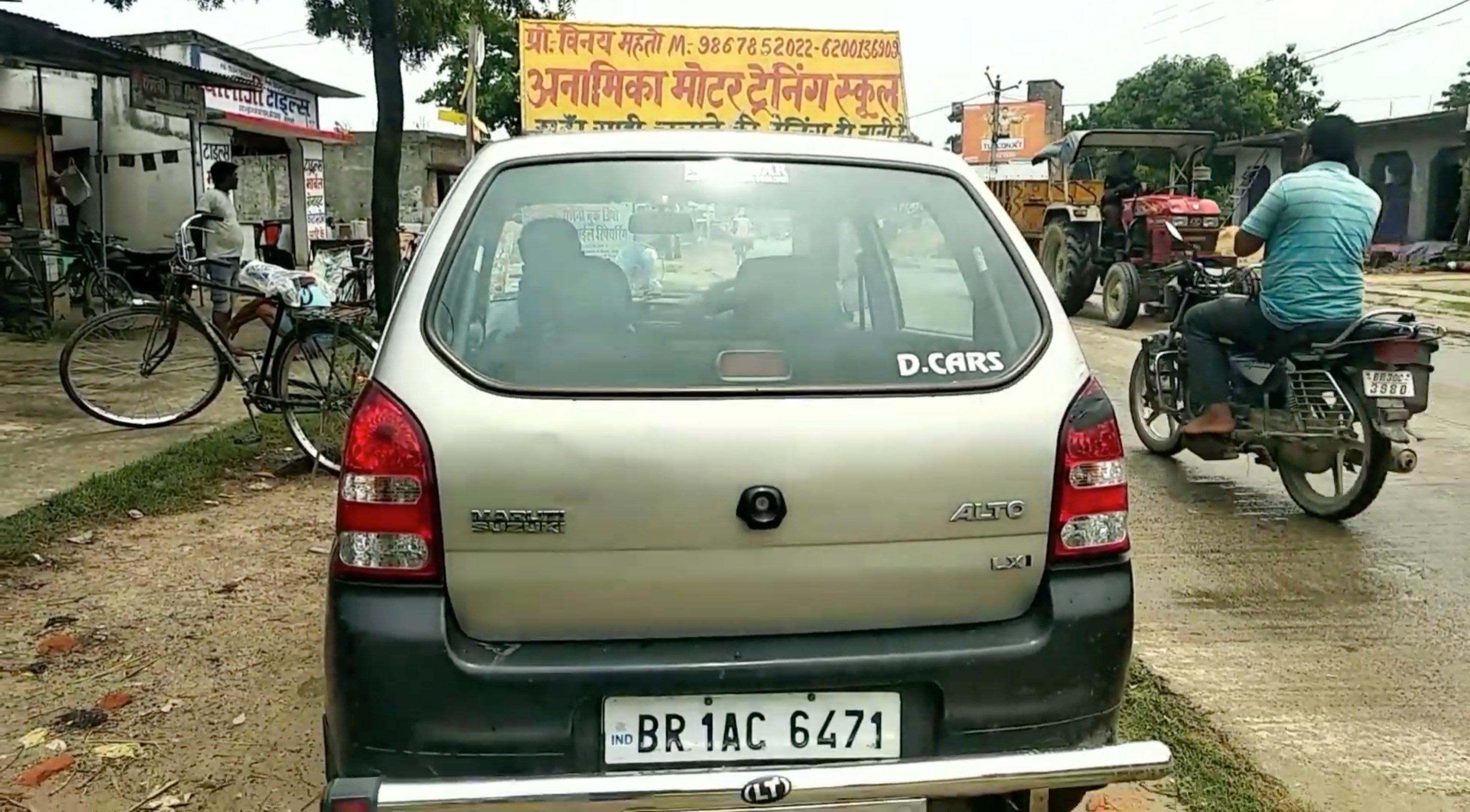 Anamika Motor Driving School YouTube Tutorial - Training vehicle with school banner